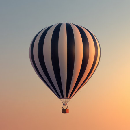 A beautiful hot air balloon with black and white stripes gracefully ascends into a clear sky during sunrise, evoking feelings of peace and adventure in nature.の素材