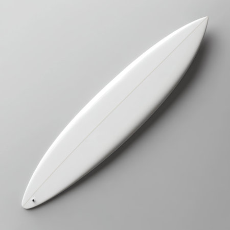 Elegant white surfboard displayed against a grey backdrop, capturing the essence of minimalism and perfect for themes related to water sports and beach lifestyles.の素材