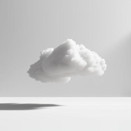 A soft, fluffy white cloud appears to float gracefully in a bright, minimalist white space. Its delicate shape casts subtle shadows, enhancing the tranquil ambiance.の素材