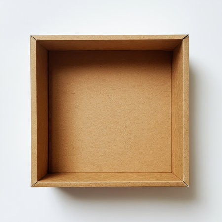 A clean, empty cardboard box with a square shape and a light brown color set against a white background. This image is ideal for various creative projects and packaging needs.の素材