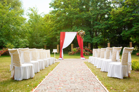 beautiful wedding arch with chairsの写真素材