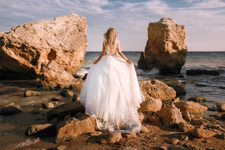 bride at the edge of the mountainの写真素材
