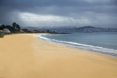 Empty Beach, Atlantic Ocean and Stormy Sky, City View.の写真素材