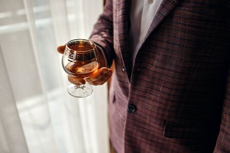 Pretty bride holding her wedding diamond ringの写真素材