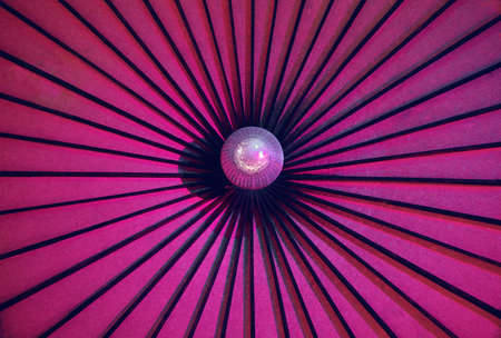 pink background with a mirror ball, night club, place for text, night life, vertical photo
