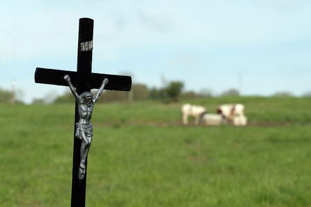 Cross along the road in the countrysideの写真素材