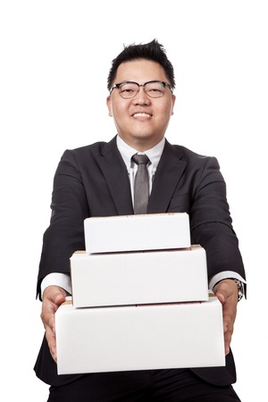 Asian businessman give 3 box and smile  isolated on white background
