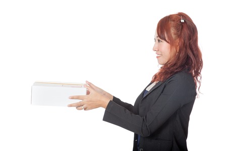 Asian office girl giving a box isolated on whtie backgroundの写真素材