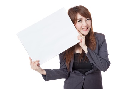 Happy Asian businesswoman hold blank sign obliquely  isolated on white backgroundの写真素材