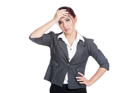 Asian office girl headache put palm to forehead and arms akimbo isolated の写真素材