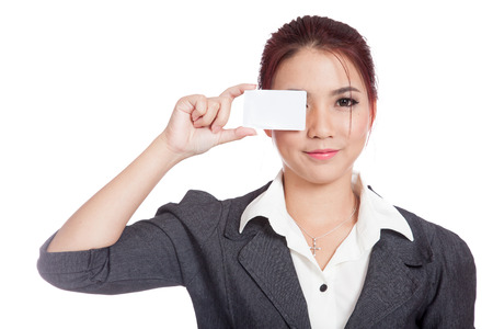 Asian businesswoman close her eye with a blank card isolated の写真素材