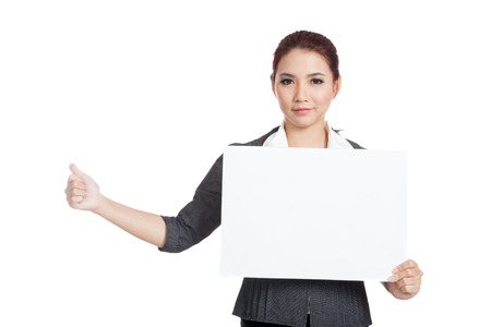 Asian businesswoman hold a blank sign and hitchhiking isolated の写真素材