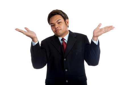 Asian businessman arms out ask what's the problam  isolated の写真素材