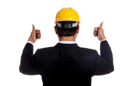 Back of Asian engineer man show thumbs up with both hand  isolated の写真素材