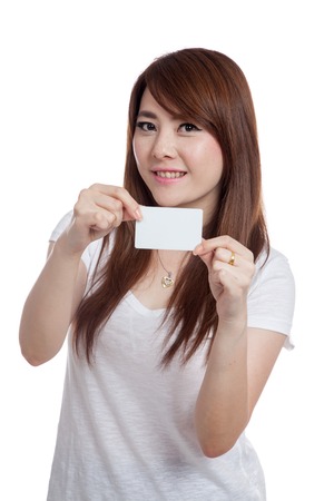 Asian girl show a  blank card with both hand  isolated on white backgroundの写真素材