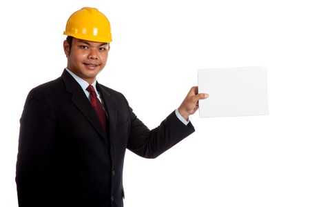 Asian engineer man show blank sign isolated on white backgroundの写真素材