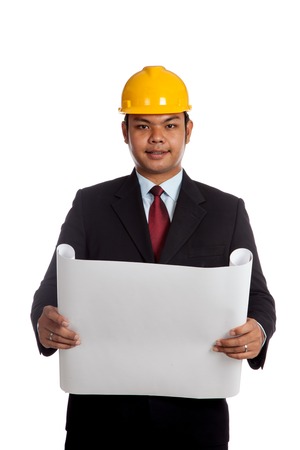 Asian engineer man open a blue print look at camera isolated on white backgroundの写真素材