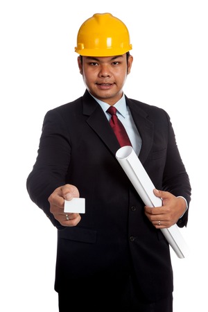 Asian engineer man hold blueprint give a blank card isolated on white backgroundの写真素材