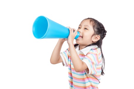 Asian little girl  annouce by megaphone  isolated on white backgroundの写真素材