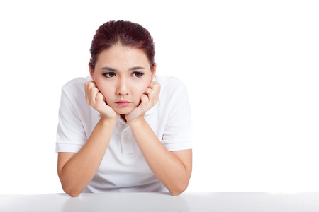 Asian girl fed up isolated on white backgroundの写真素材