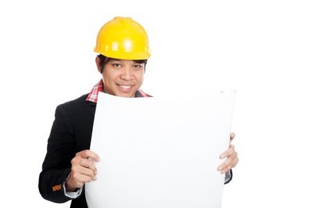 Asian engineer man with blueprint  isolated on white backgroundの写真素材