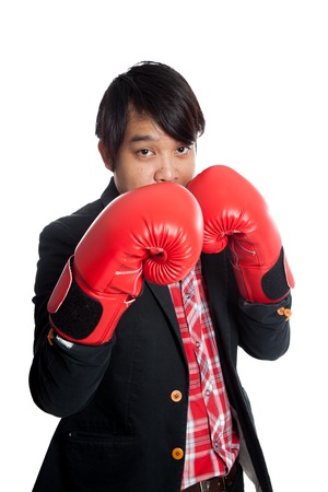 Asian man wear boxing gloves keep his guard up  isolated on white backgroundの写真素材
