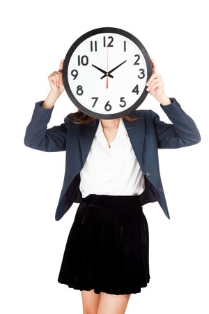 Asian businesswoman with clock on face  isolated on white backgroundの写真素材