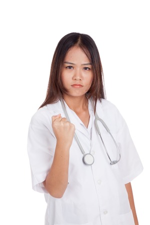 Portrait of confidence Asian young female doctor hold fist  isolated on white backgroundの写真素材