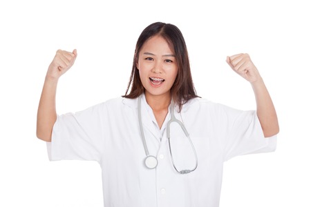 Asian young female doctor happy with success  isolated on white backgroundの写真素材