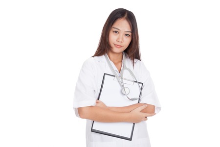 Asian young female doctor hold a clipboard  isolated on white backgroundの写真素材