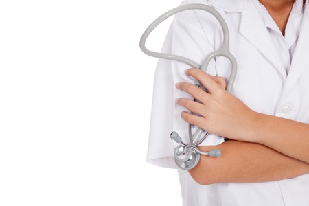 Close up of stethoscope in hand of Asian female doctor  isolated on white backgroundの写真素材