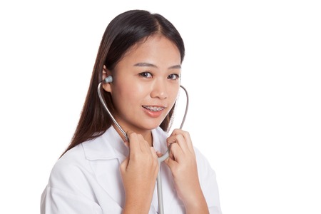 Asian young female doctor smile  use stethoscope  isolated on white backgroundの写真素材