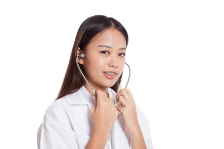 Asian young female doctor smile  use stethoscope  isolated on white backgroundの写真素材