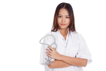 Young Asian female doctor hold stethoscope and smile  isolated on white backgroundの写真素材