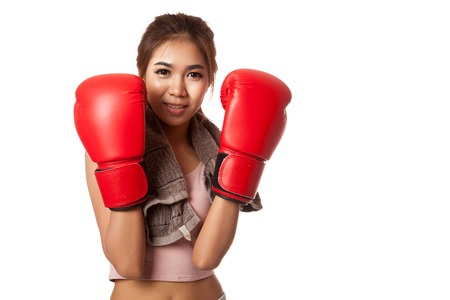 Asian slim girl  with red  boxing glove  isolated on white 