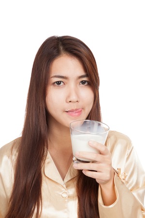 Asian woman drink milk  licking her lip  isolated on white backgroundの写真素材