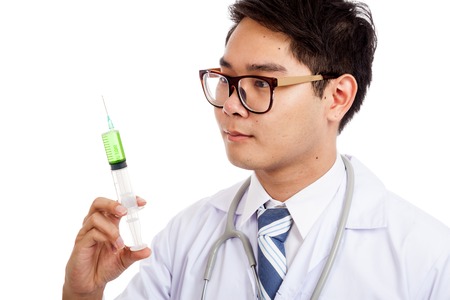 Asian male doctor hold syringe with green medicine  isolated on white backgroundの写真素材