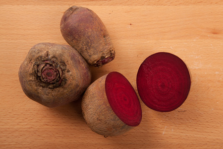 Fresh beetroots on wooden background