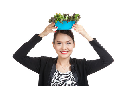 Healthy Asian business woman with salad  isolated on white backgroundの写真素材