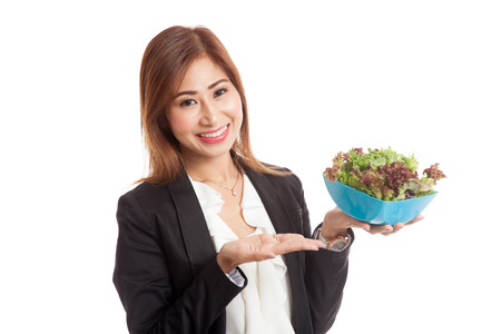 Healthy Asian business woman with salad  isolated on white backgroundの写真素材