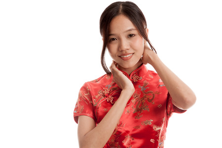 Asian girl in chinese cheongsam dress  isolated on white backgroundの写真素材