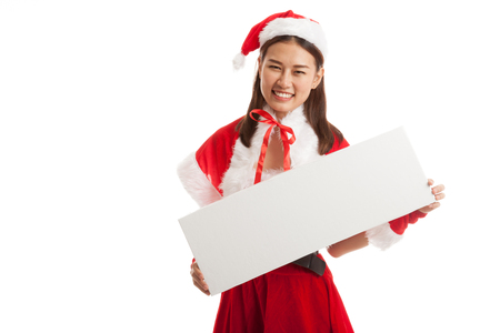 Asian Christmas Santa Claus girl with blank sign  isolated on white background.の写真素材
