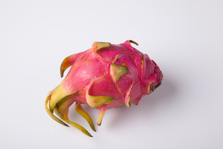 Ripe red dragon fruit  on whtie backgroundの写真素材