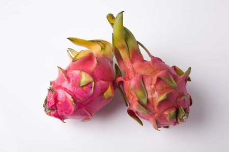 Ripe red dragon fruit  on whtie backgroundの写真素材