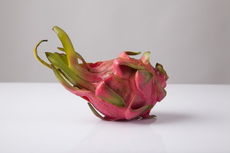 Ripe red dragon fruit  on whtie backgroundの写真素材