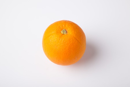 Ripe fresh orange on white backgroundの写真素材