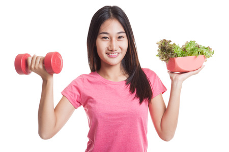 Healthy Asian woman with dumbbells and salad  isolated on white background.の写真素材