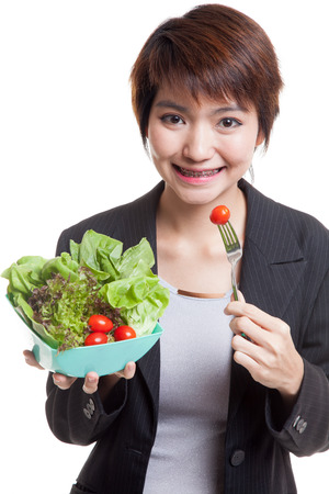 Healthy Asian business woman with salad  isolated on white background.の写真素材