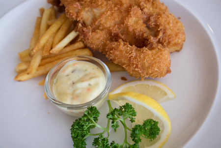 Delicious Fish and chips on white plateの写真素材
