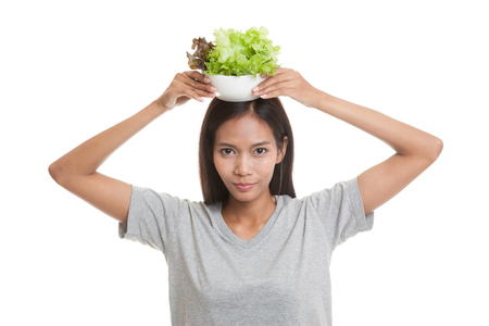 Healthy Asian  woman with salad  isolated on white background.の写真素材